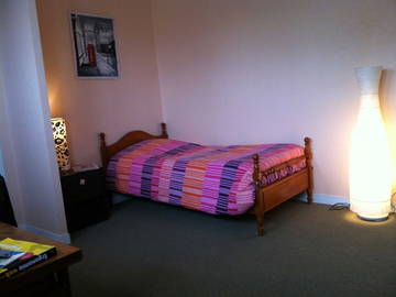 Roomlala | Aluguel de quarto na casa de um residente