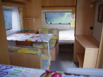 Roomlala | Caravan with use of a house