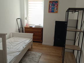 Habitación compartida con un residente local