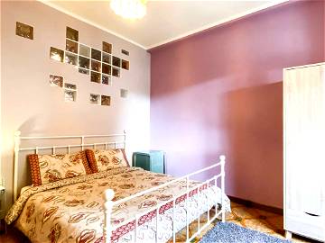 Roomlala | Dormitorio Doble Colorido Y Acogedor En Pigneto