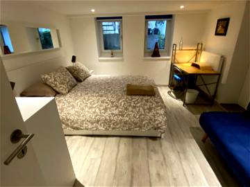 Roomlala | Grazioso mini appartamento al piano interrato rifinito
