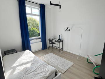 Roomlala | Habitación en alquiler en co-living