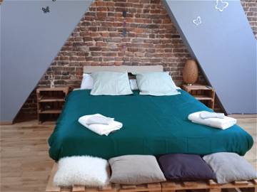 Roomlala | Habitación muy grande con salón y nevera.