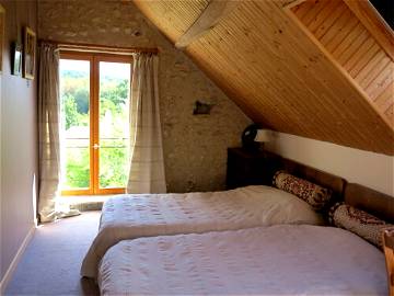 Roomlala | In restored farmhouse bedroom with view of the valley