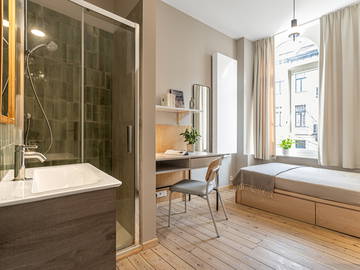 Roomlala | Quarto compartilhado em uma casa em Schuman (Schaerbeek)