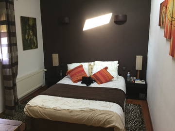 Roomlala | Quarto confortável em um oásis verde