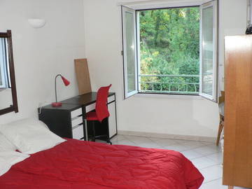 Roomlala | Quarto em acomodação compartilhada com um residente local