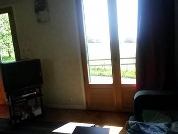 Roomlala | Sala com sofá cama em casa com jardim