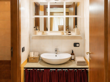 Habitación en casa del anfitrión en alquiler en Milano - foto 11: Cuarto de baño-11