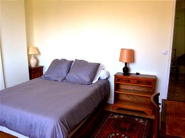 Roomlala | Zimmer mit Doppelbett und Gartenblick